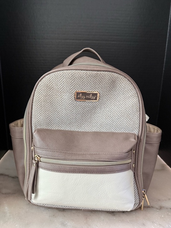 Itzy Ritzy Handbags - Itzy Ritzy Mini Diaper Bag Vanilla and Beige
